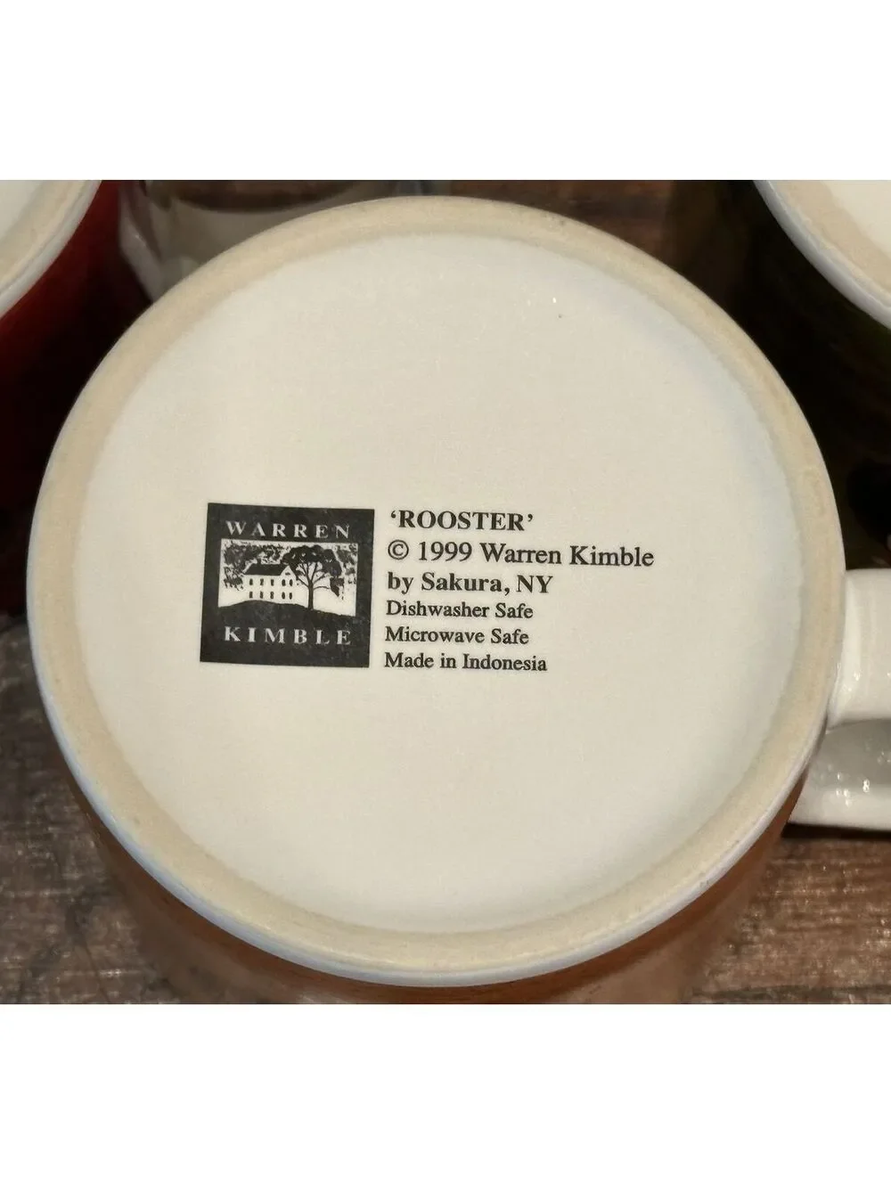 Vintage Sakura Oneida Country Quartet Warren Kimble Rooster 12oz Orange Mug |